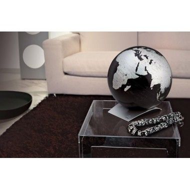Terrestrial globe to place on a metallic black designer base