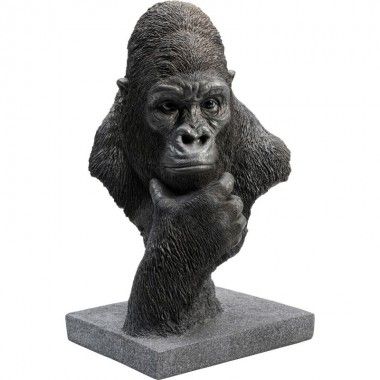 Estatua de cabeza de gorila pensando en gorila negro
